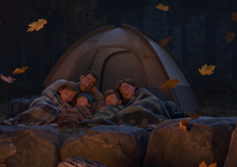 The Family — asleep under blankets beside their tent, beyond the fire ring stones.